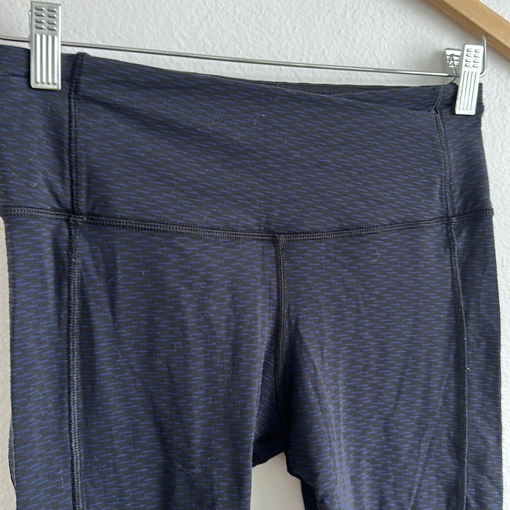 Lululemon black and navy leggings.